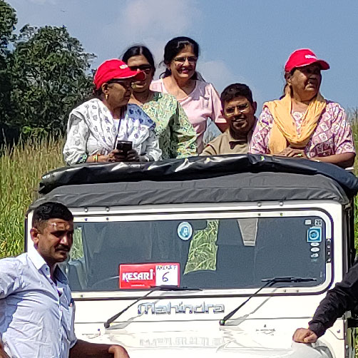 family enjoying jeep safari operated by thekkady jungle safari